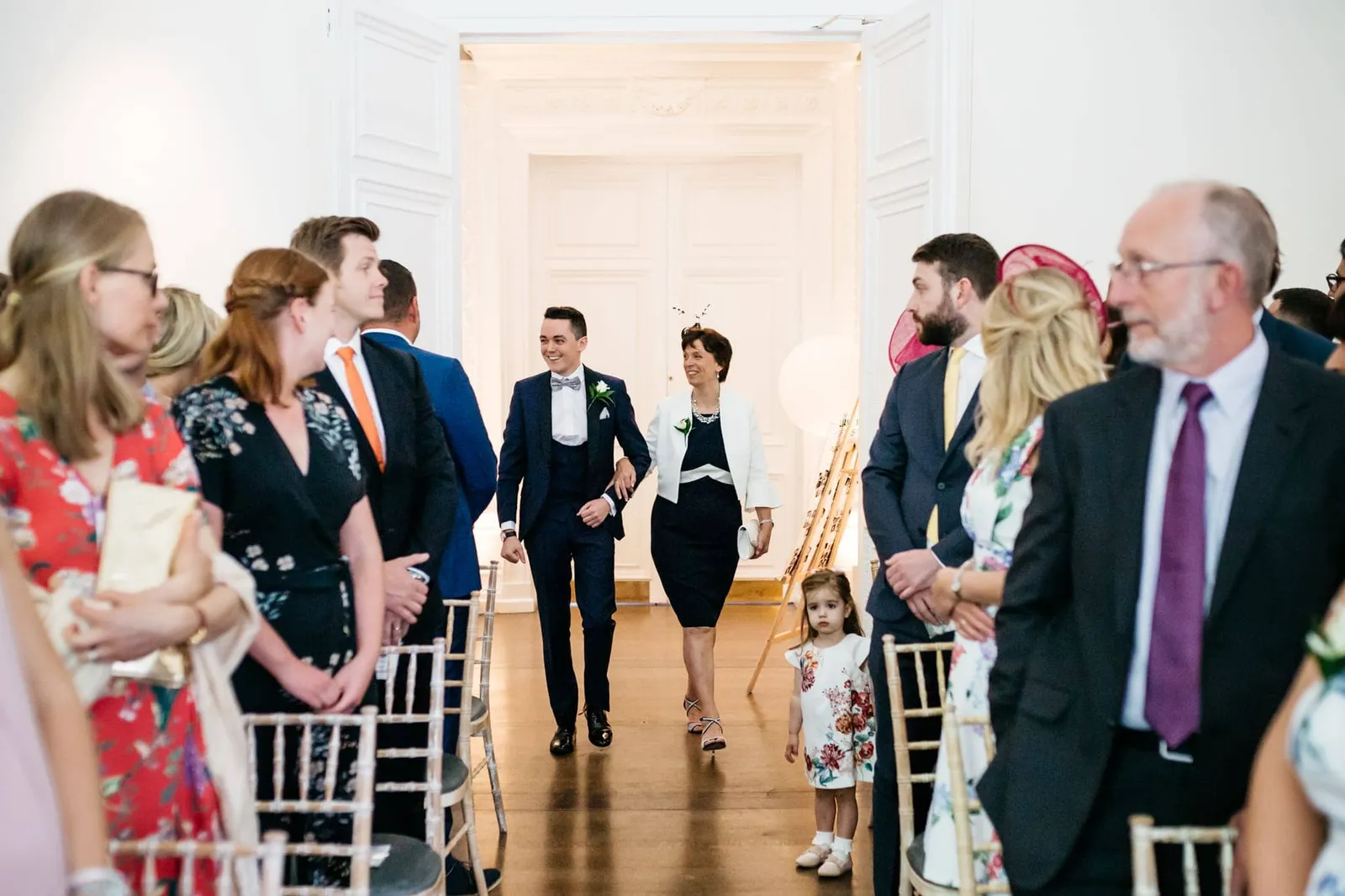 Groom entering wedding ceremony