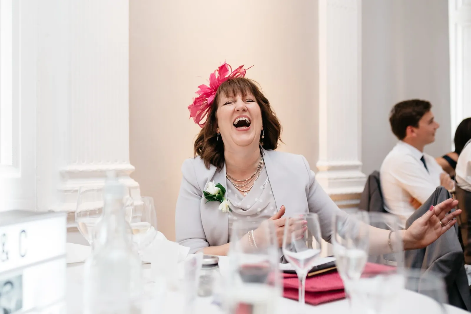 Mother of groom laughing